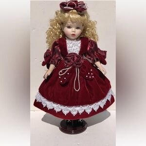 Porcelain Dolls Collectible by Melissa Jane Wooden Stand in Red Dress Blue Eyes